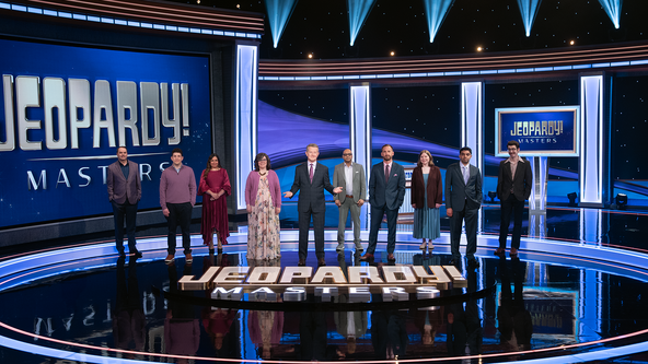Ken Jennings with all nine 2025 Masters Contestants on The Alex Trebek Stage